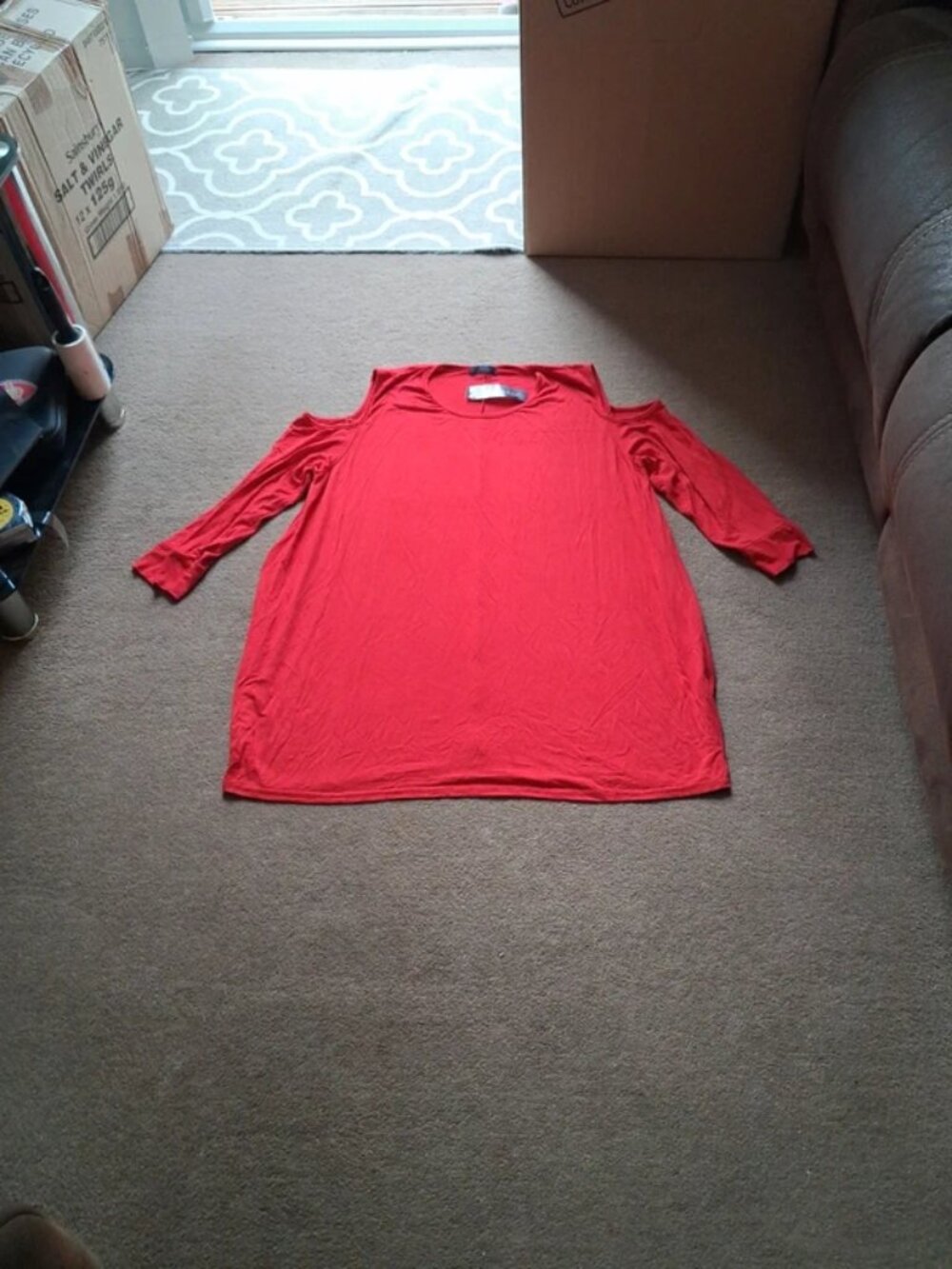 Red long-sleeve top